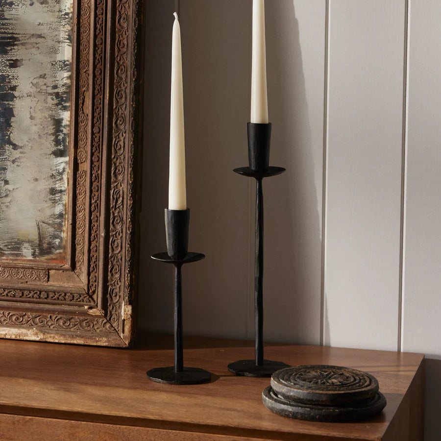 Atelier Black Iron Candle Stands holding white candles on hall table next to 2 stacked Vintage Indian Wood Chapati Plates - available at LOVINLIFE Co Byron Bay for all your gifts, candles and interior decorating needs