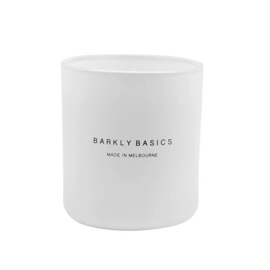 White candle with 'Barkly Basics' text on a white background. Scented with Lemongrass and Kaffir Lime. Available at LOVINLIFE Co Byron Bay for all your gifts, candles and interior decorating needs
