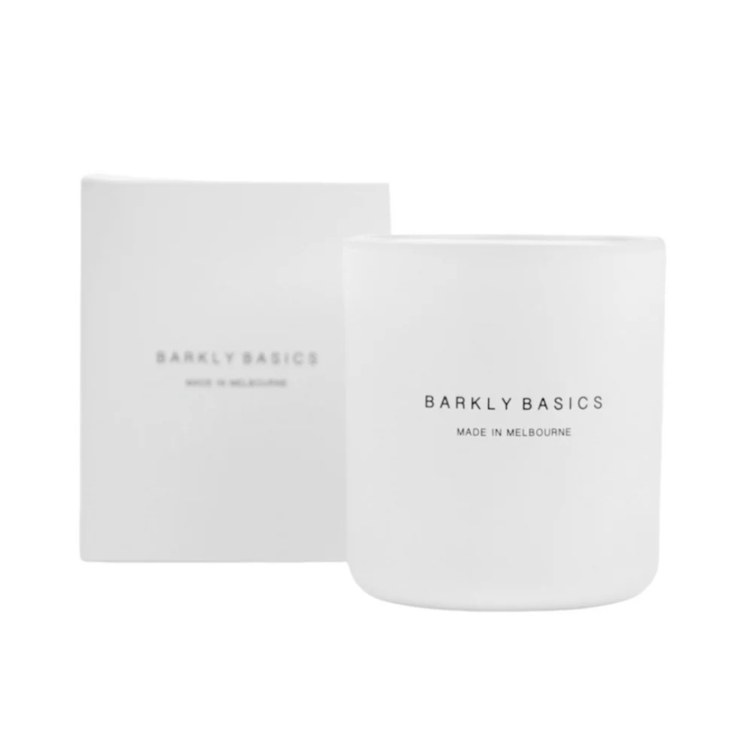 White candle and packaging with 'Barkly Basics' branding on a white background. Scented with Lemongrass and Kaffir Lime. Available at LOVINLIFE Co Byron Bay for all your gifts, candles and interior decorating needs