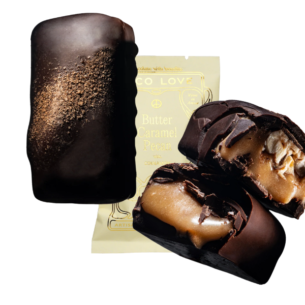 Images shows unwrapped and wrapped (purple) Loco Love Butter Caramel Pecan Chocolates. Vegan, gluten-free, sustainably sourced and no refined sugars. 
Available LOVINLIFE Co Byron Bay.