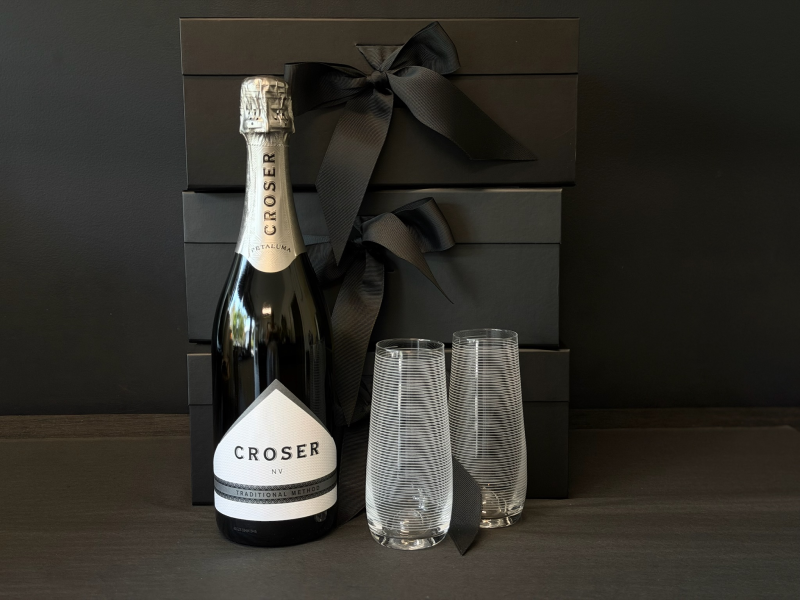 Celebrate Gift Box containing Croser Sparkling Wine, 2 stemless Champagne flutes etched with lines and a twin box of Loco Love Chocolates. Available at LOVINLIFE Co Byron Bay