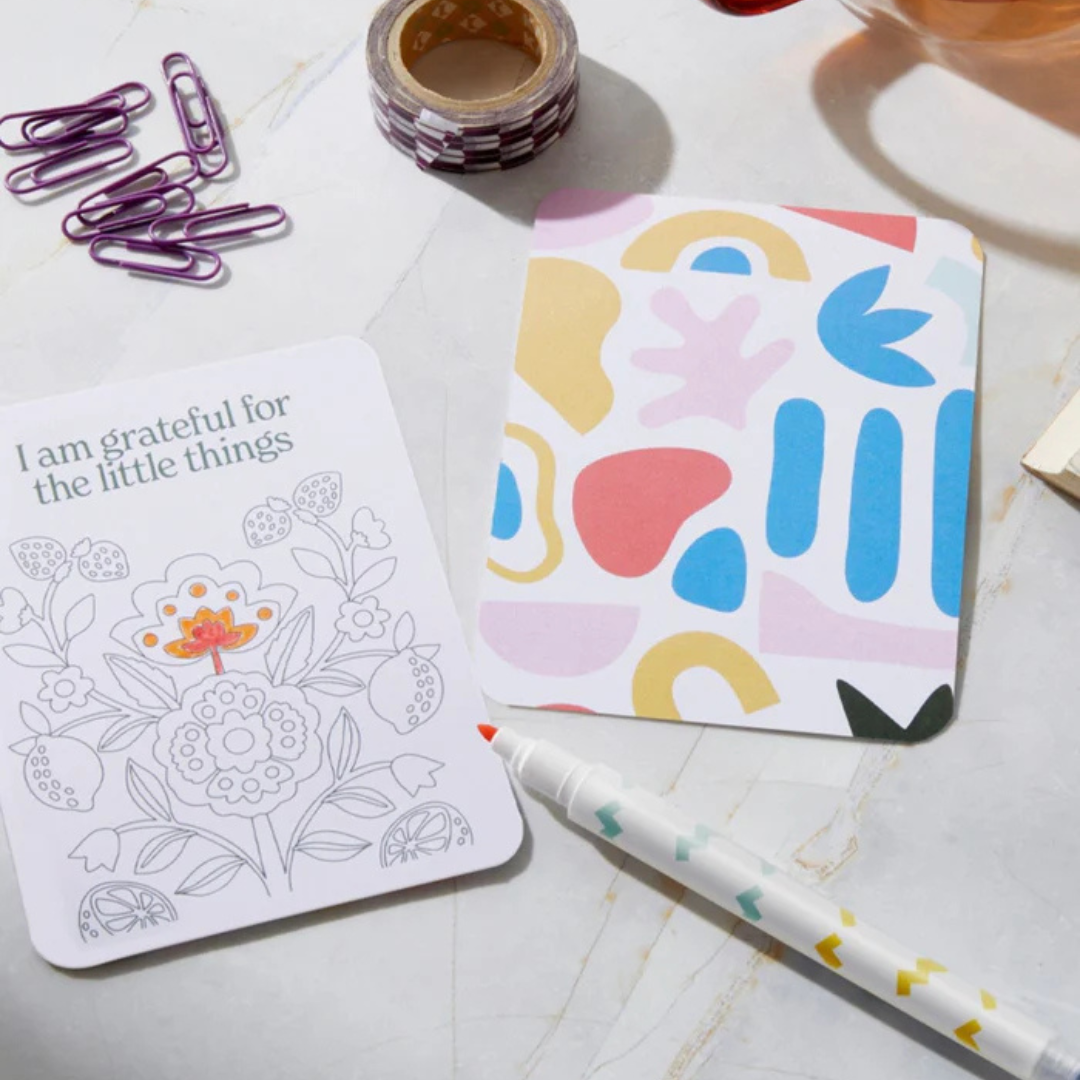 Affirmation Cards - Colour Your Own by Journey of Something - picture of a card being coloured in with a pen lying next to it - Stocked at LOVINLIFE Co Byron Bay for all your gifts, candles and interior decorating needs