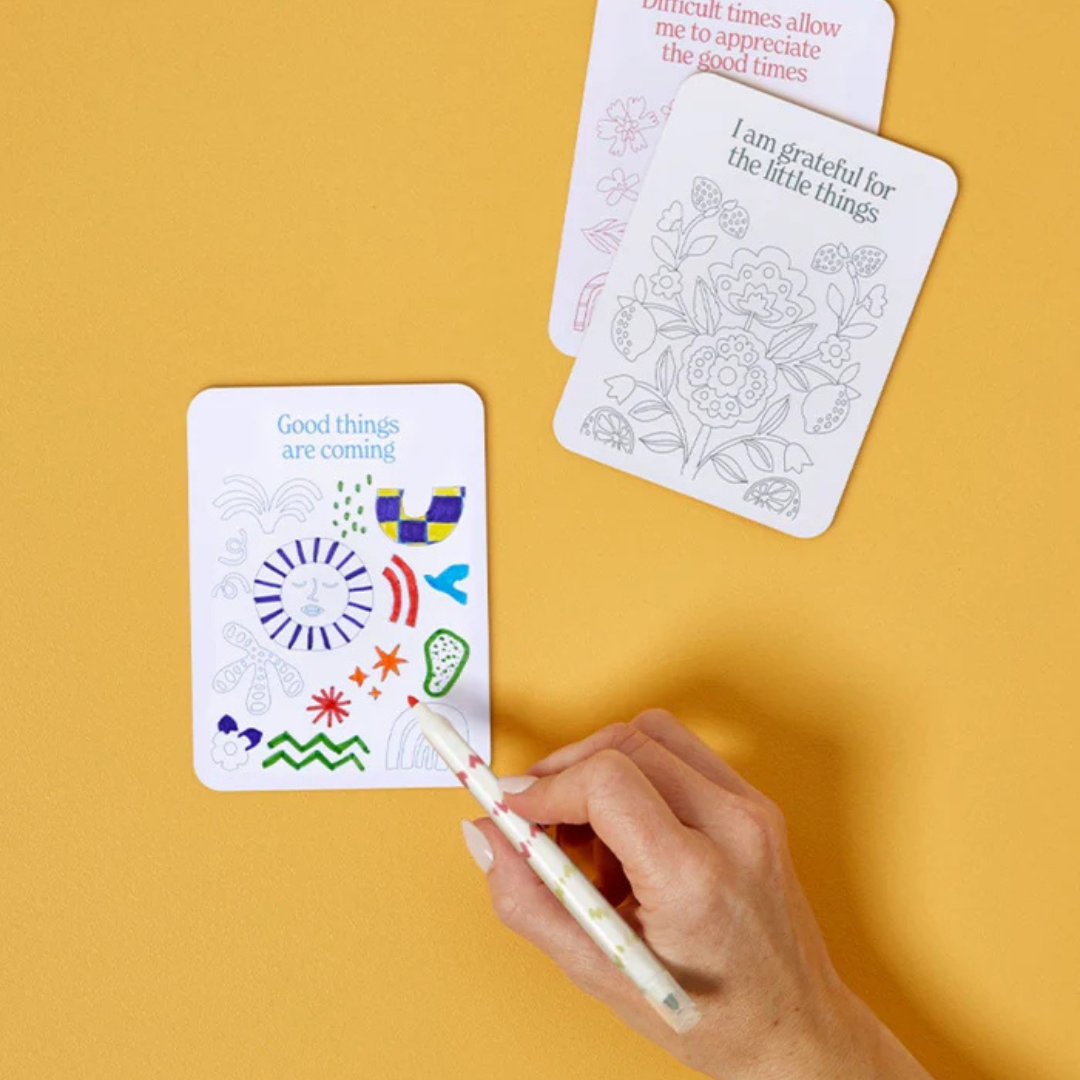 Affirmation Cards - Colour Your Own by Journey of Something - picture of a hand colouring in cards - Stocked at LOVINLIFE Co Byron Bay for all your gifts, candles and interior decorating needs