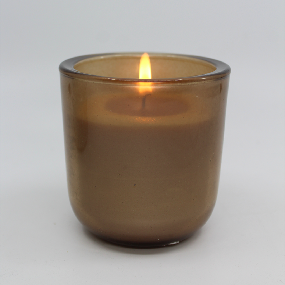 Coloured Glass Candle - Limited Edition from Francalia in champagne, pictured alight on a white background - Stocked at LOVINLIFE Co Byron Bay for all your gifts, candles and interior decorating needs