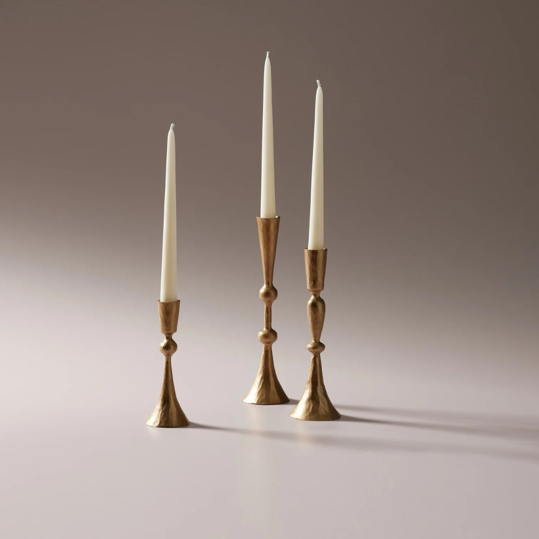 Enchant Brass Candle Stands x 3 all holding white candles - available at LOVINLIFE Co Byron Bay for all your gifts, candles and interior decorating needs