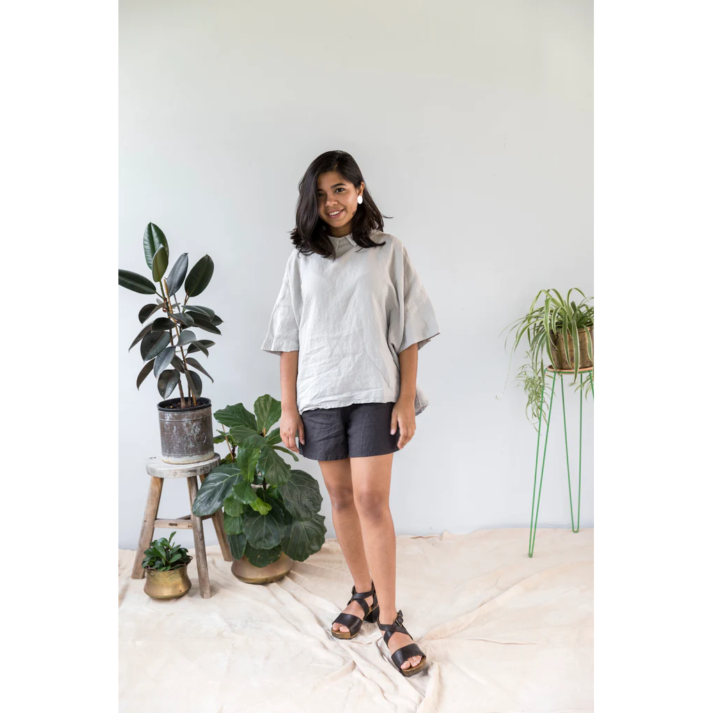 French flax linen unisex boxer shorts, loose, comfy and playful for men and women of all shapes and sizes - Available in 5 colours: White, Pinstripe, Natural, Navy & Charcoal – Navy linen boxer shorts pictured on a woman - available at LOVINLIFE Co Byron Bay for all your gifts, candles and interior decorating needs