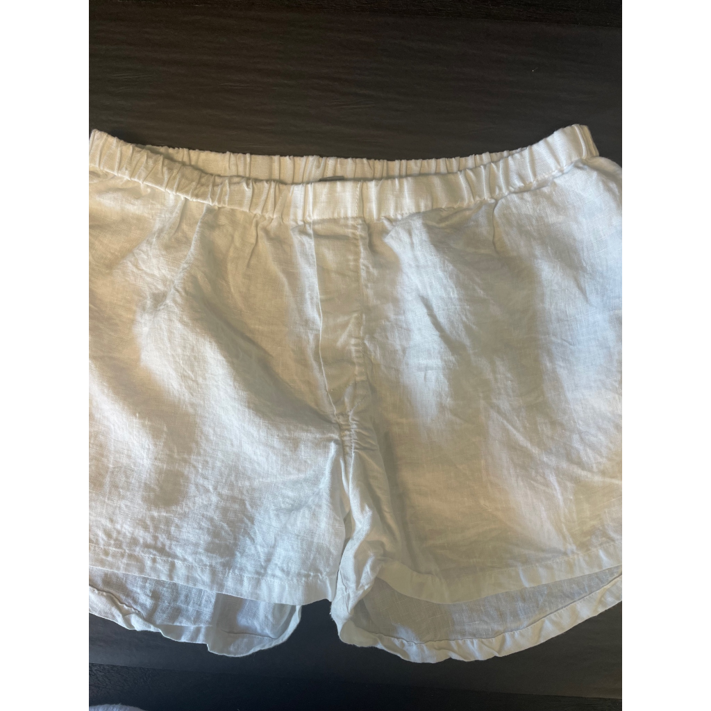 French flax linen unisex boxer shorts, loose, comfy and playful for men and women of all shapes and sizes - Available in 5 colours: White, Pinstripe, Natural, Navy & Charcoal – White linen boxer shorts pictured in a flat lay - available at LOVINLIFE Co Byron Bay for all your gifts, candles and interior decorating needs