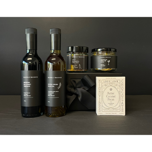 Gourmet Pantry Gift Box containing Extra Virgin Olive Oil, Balsamic Vinegar,  Chilli Margarita Salt, Dried Lime Slices and a twin box of Loco Love Chocolates. Available at LOVINLIFE Co Byron Bay