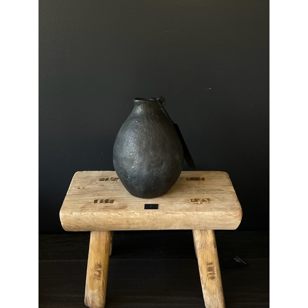 Lovinlife Co ByronBay - Handmade Ceramics Range - Tiny Handles Vessels by MC STUDIO CERAMICS - Volcanic Black clay ceramic Carafe/jug with tiny handles, little guy #1 pictured on wooden stool - available at LOVINLIFE Co Byron Bay for all your gifts, candles and interior decorating needs