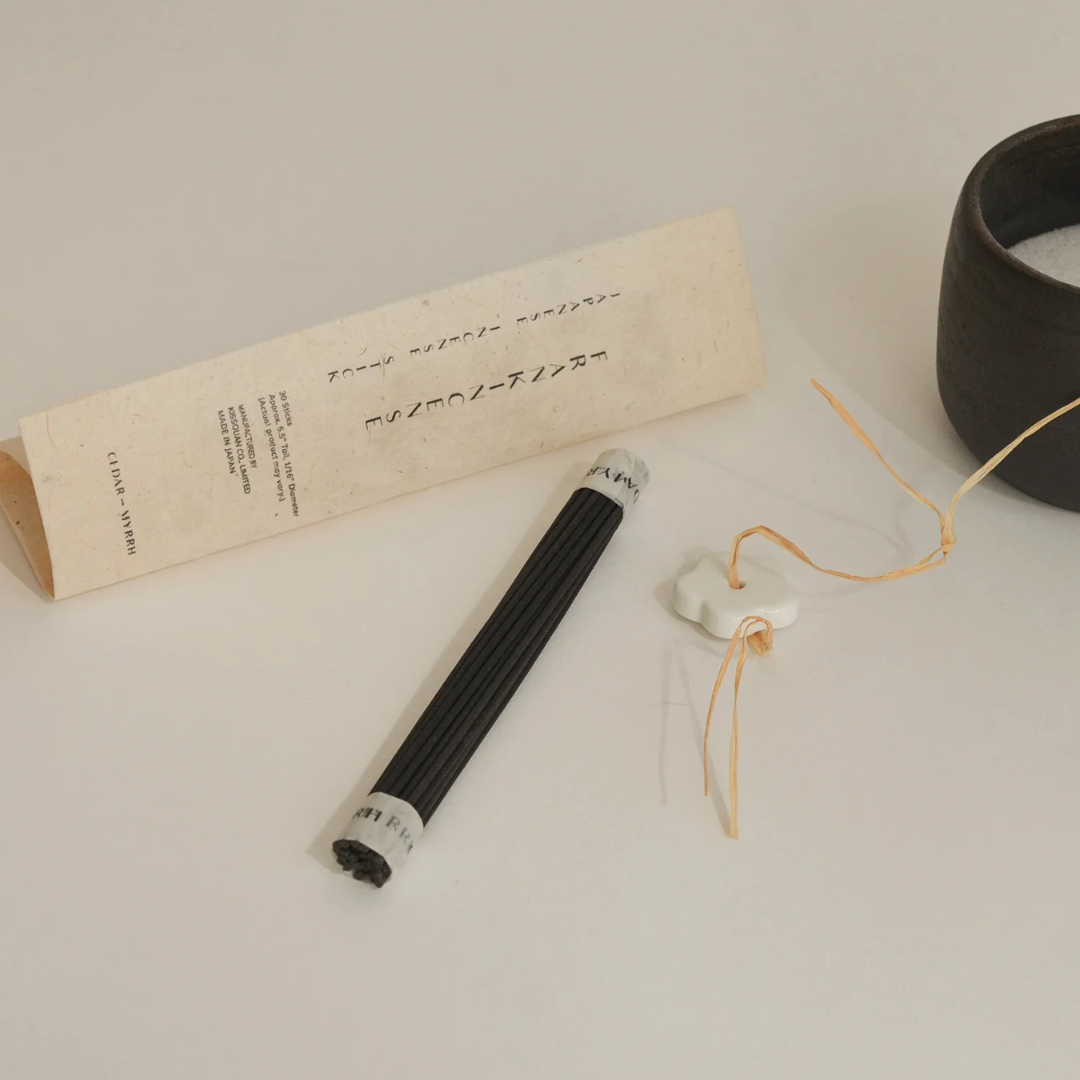 Incense Set - picture of the set unwrapped with sticks taped together and incense stick holder lying next to them - Stocked at LOVINLIFE Co Byron Bay for all your gifts, candles and interior decorating needs