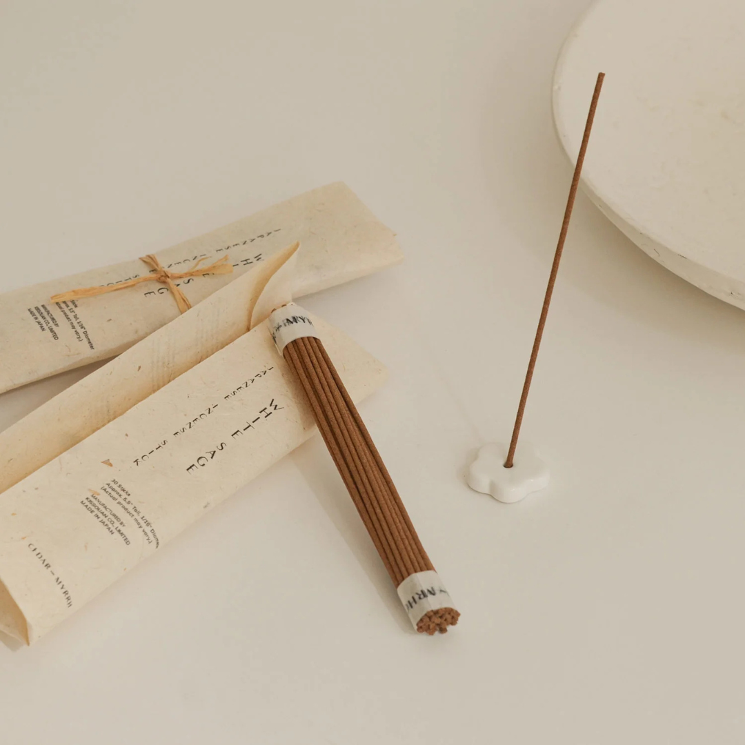 Incense Set - picture of the set unwrapped with incense stick holder lying next to the packet and roll of incense sticks - Stocked at LOVINLIFE Co Byron Bay for all your gifts, candles and interior decorating needs