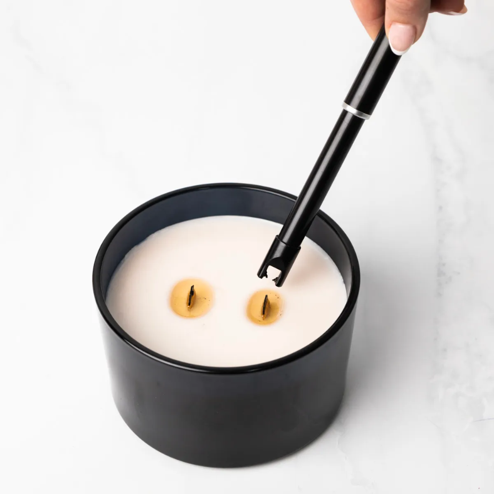 USB Rechargeable Candle and Incense Lighter - Black Lighter pictured lighting twin wick candle - Stocked at LOVINLIFE Co Byron Bay for all your gifts, candles and interior decorating needs