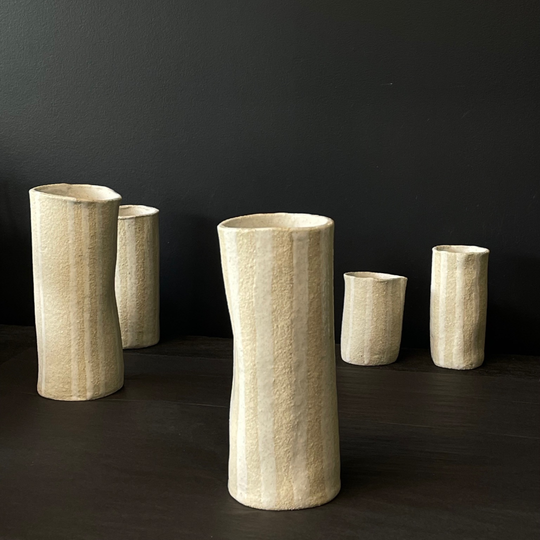 Lovinlife Co ByronBay - Handmade Signature Ceramics Range - Natural white clay vases finished with a ‘milk gloss’ hand painted glaze detail - The Stripe Series, Ceramic Vase V1 - Large Even Stripe pictured infront of all other sizes - available at LOVINLIFE Co Byron Bay for all your gifts, candles and interior decorating needs