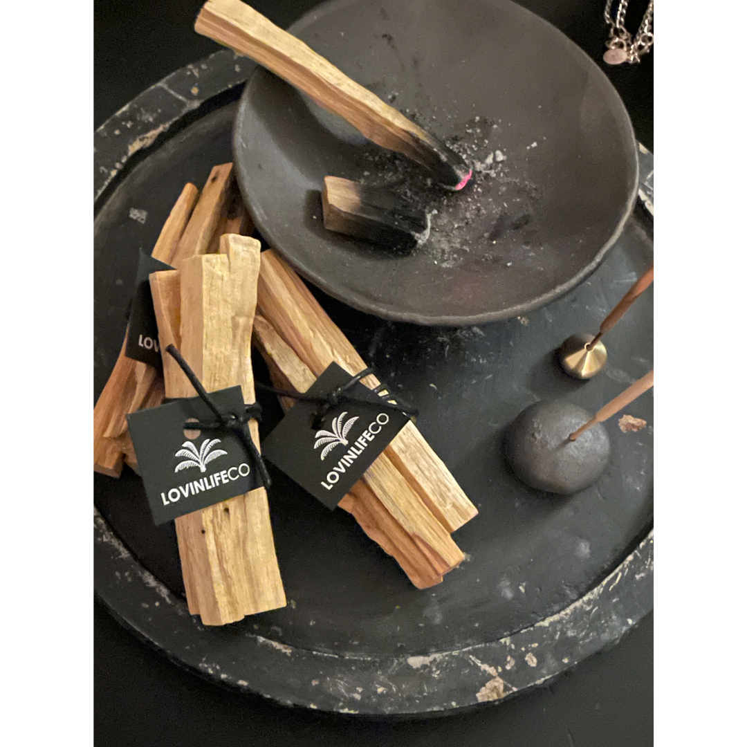 Lovinlife Co ByronBay - Palo Santo Stick Bundle - Burning Ritual Stick - 3 stacks next to black clay smudging bowl - available at LOVINLIFE Co Byron Bay for all your gifts, candles and interior decorating needs