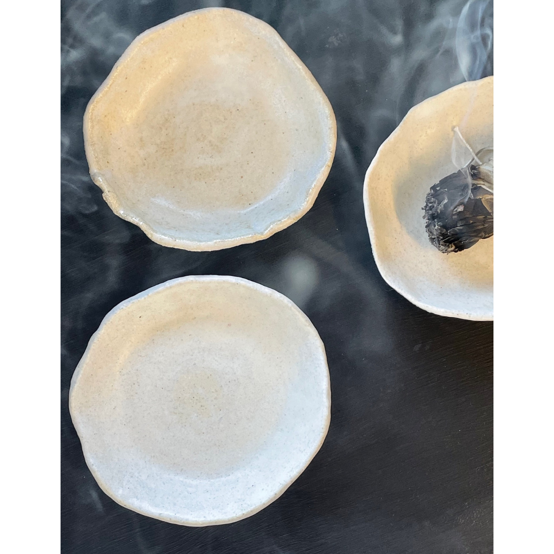Lovinlife Co ByronBay – handmade Ceramic Smudging Plate for your Smudge sticks or Palo Santo, soap or trinkets – all sizes pictured as flat lay with smoking sage stick - available at LOVINLIFE Co Byron Bay for all your gifts, candles and interior decorating needs