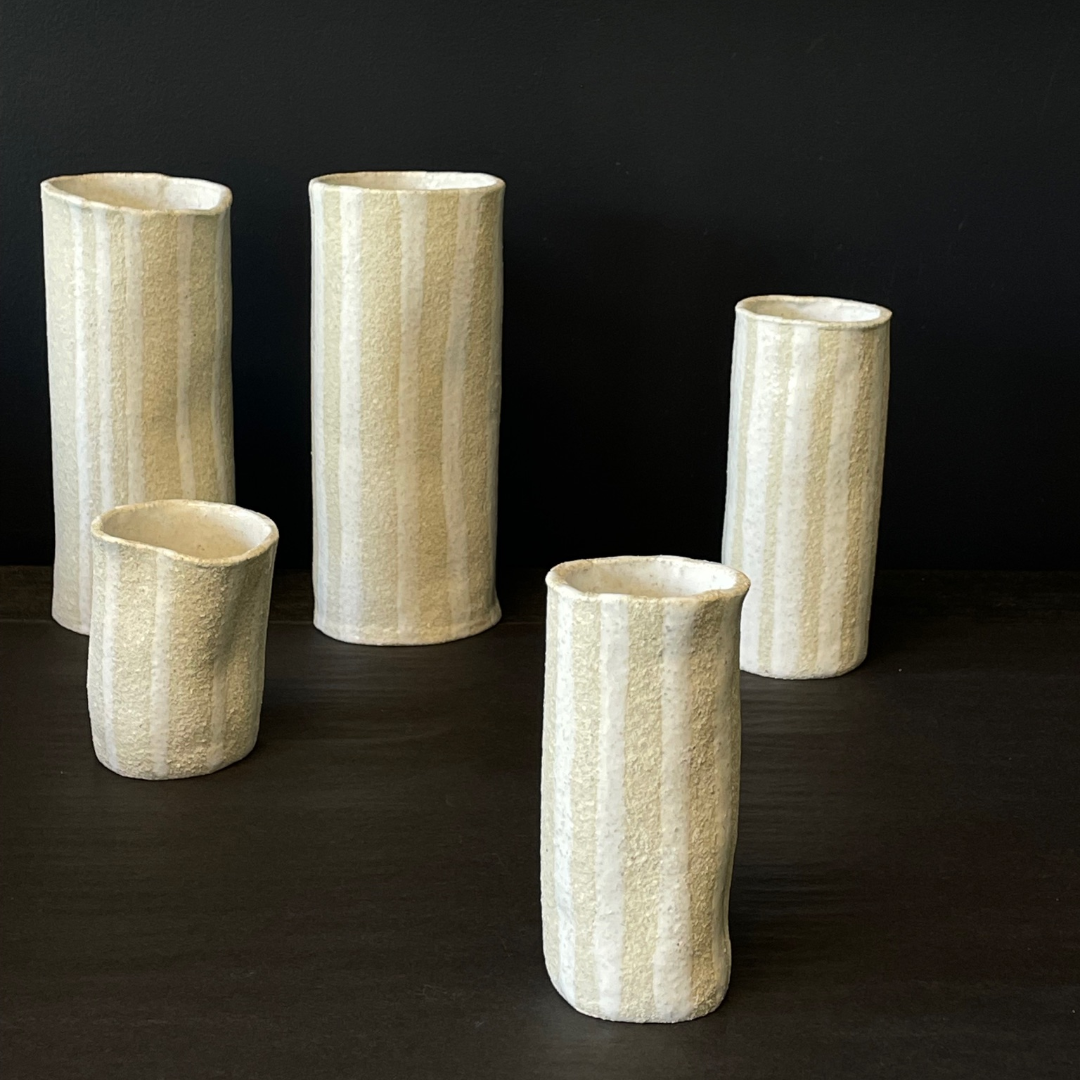 Lovinlife Co ByronBay - Handmade Signature Ceramics Range - Natural white clay vases finished with a ‘milk gloss’ hand painted glaze detail - The Stripe Series, Ceramic Vase V4 - Small Skinny pictured infront of all other sizes - available at LOVINLIFE Co Byron Bay for all your gifts, candles and interior decorating needs