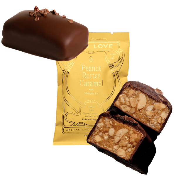 Images shows unwrapped and wrapped (yellow) Loco Love Peanut Butter Caramel Chocolates. Vegan, gluten-free, sustainably sourced and no refined sugars. 
Available LOVINLIFE Co Byron Bay.