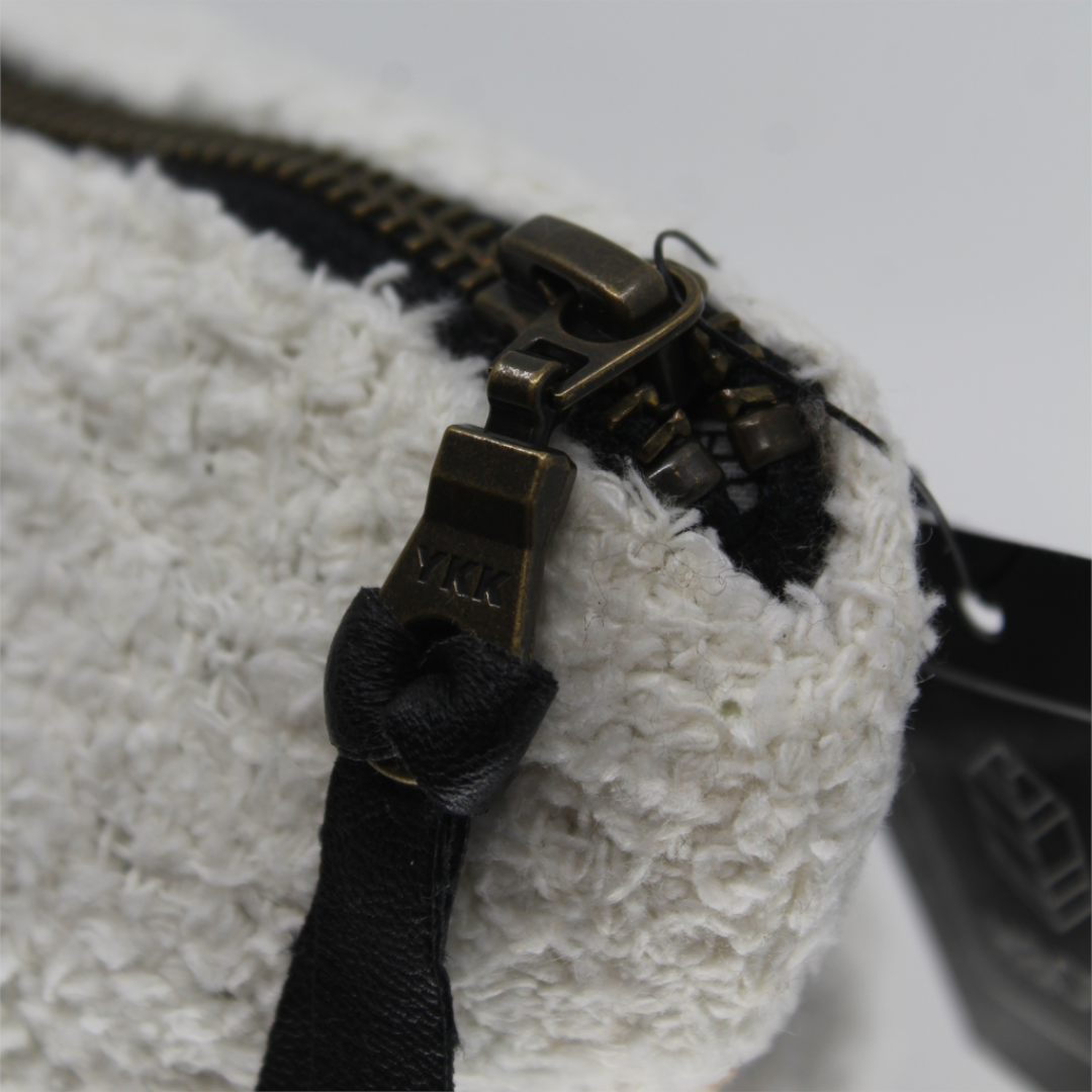 Travel Pouch - The Softee - made from cotton-boucle fabric, available in White, Tabac and Khaki/Olive – White pictured showing close up of fabric and zipper - Stocked at LOVINLIFE Co Byron Bay for all your gifts, candles, homewares and interior decorating needs