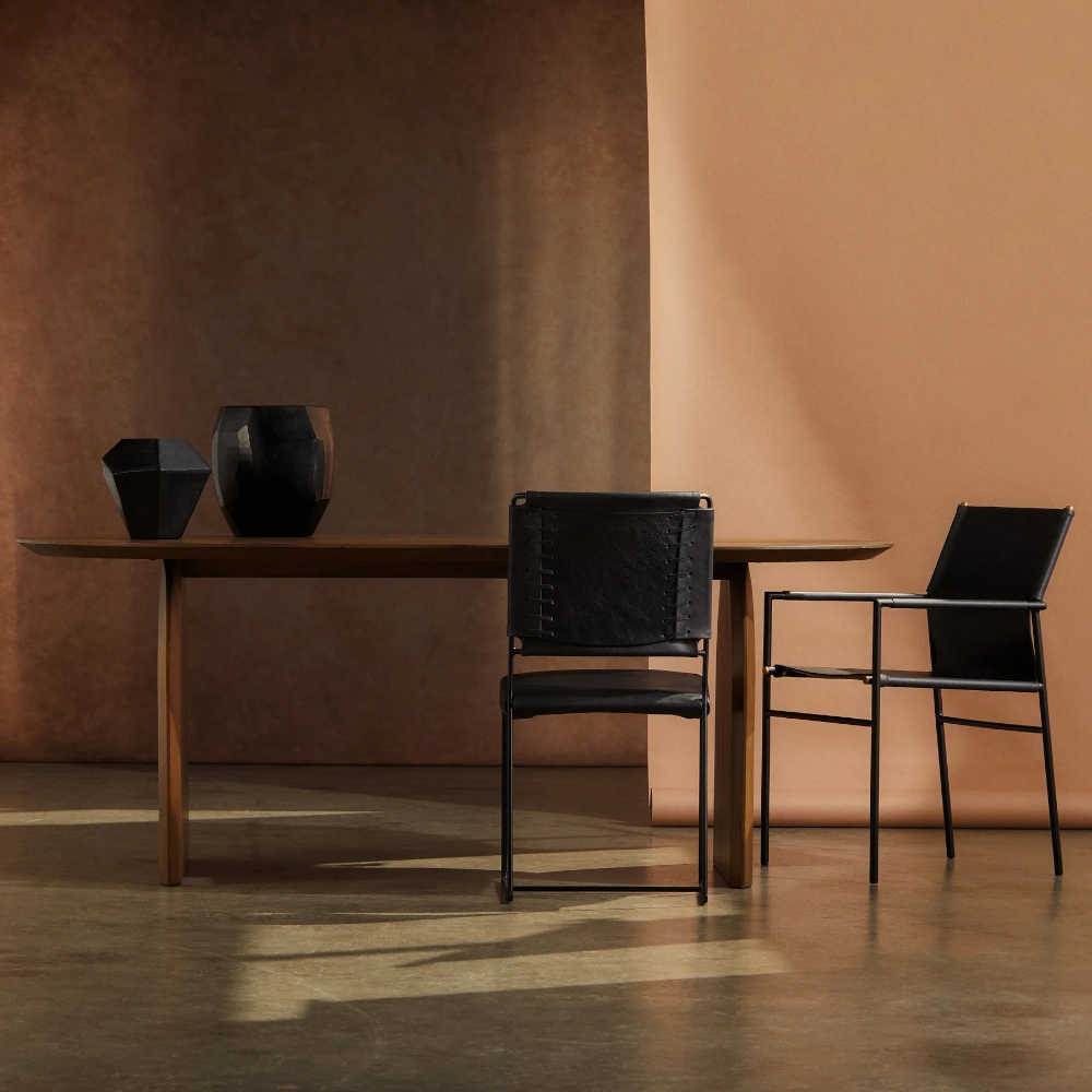 Indigo Love Sculpt Black Vase - Medium and Large on Table - high-quality opaque black glass with polygon shapes and geometric design - art that doubles as a functional vase or candle/tealight lantern - Stocked at LOVINLIFE Co Byron Bay for all your gifts, candles and interior decorating needs