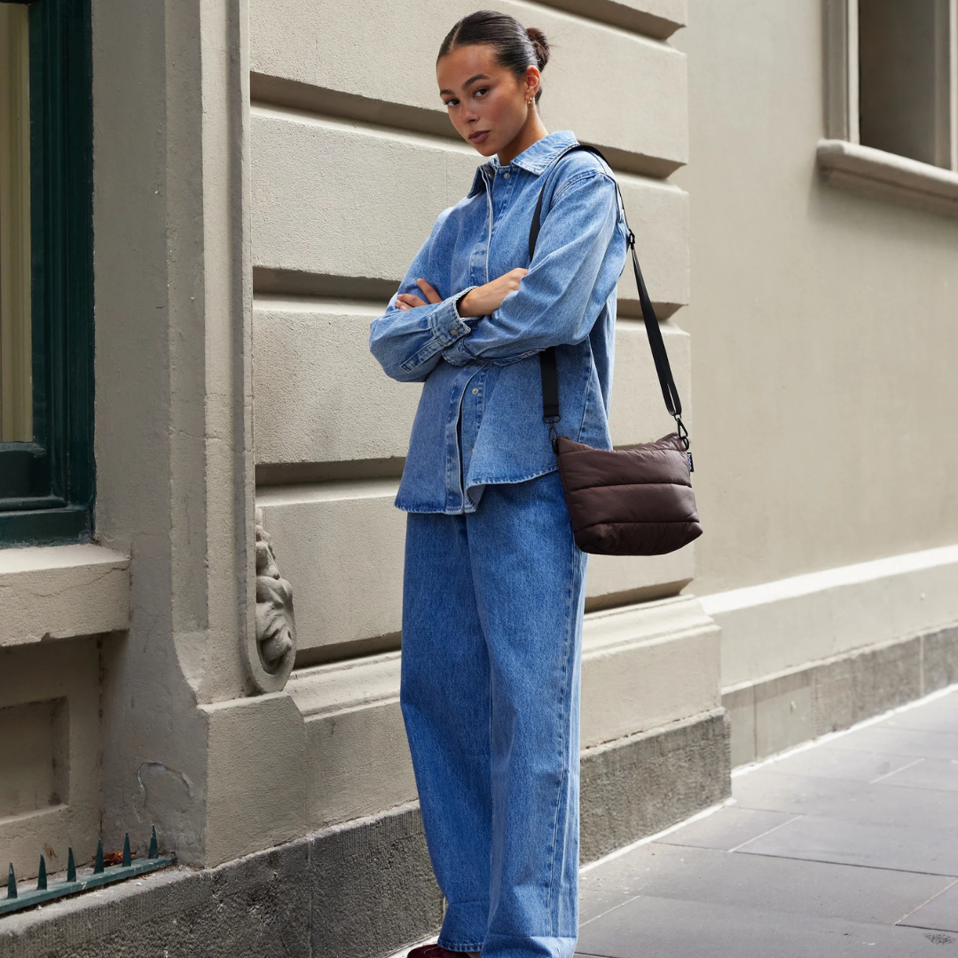 Stash Base Crossbody Bag - an everyday crossbody bag in soft, cloud-like fabric - chocolate bag pictured being worn as a shoulder bag - Stocked at LOVINLIFE Co Byron Bay for all your gifts, candles and interior decorating needs