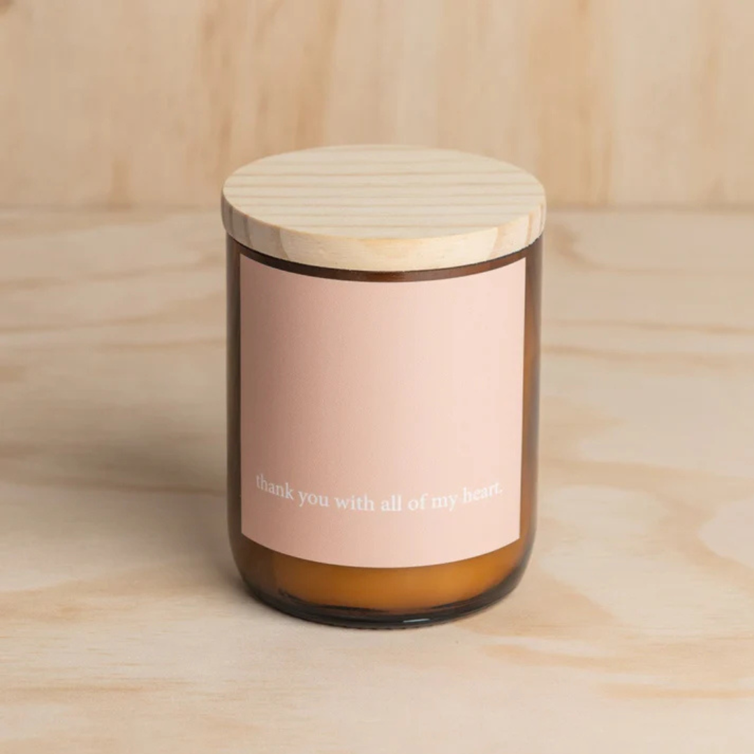 Commonfolk Heartfelt Candle - Palm Desert Scent with sandalwood + patchouli - "Thank you with all of my heart" jar pictured on plywood backdrop with lid on - Stocked at LOVINLIFE Co Byron Bay for all your gifts, candles and interior decorating needs