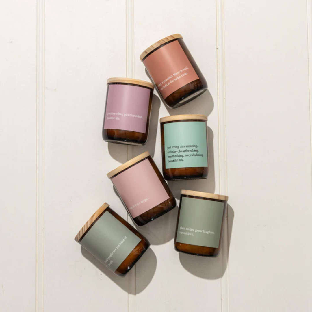 Commonfolk Heartfelt Candle - Tulum Scent with mango + lime - "Kind people are my kind of people" jar pictured from above with other candles from the Heartfelt range - Stocked at LOVINLIFE Co Byron Bay for all your gifts, candles and interior decorating needs