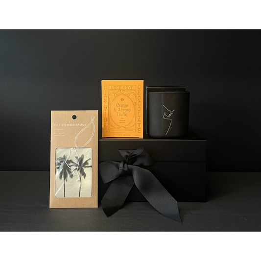 Men's or Unisex Gift Box containing an Air Freshener, a hand poured black wax candle and a twin box of Loco Love Chocolates. Great gift for men. Available at LOVINLIFE Co Byron Bay