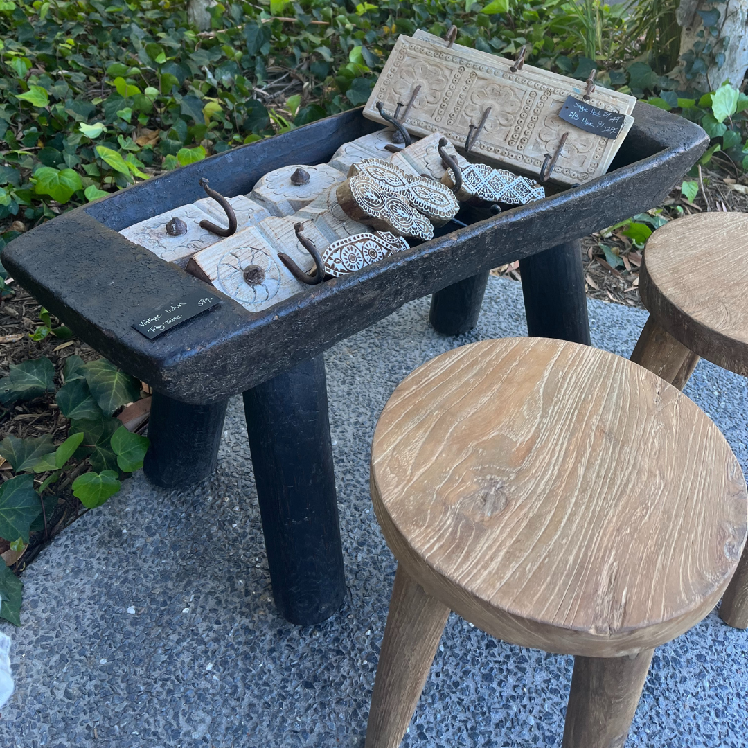 Indigo Love Vintage Indian Tray on Stand - Crafted from reclaimed wood - Indian Storage Tray on legs - display stand or tray - great to hold towels in a bathroom or food or drinks outside - on display holding wooden trinkets and hooks in shop - Stocked at LOVINLIFE Co Byron Bay for all your gifts, candles and interior decorating needs
