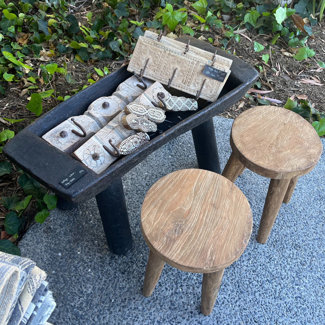 Indigo Love Vintage Indian Tray on Stand - Crafted from reclaimed wood - Indian Storage Tray on legs - display stand or tray - great to hold towels in a bathroom or food or drinks outside - on display holding wooden trinkets and hooks in shop - Stocked at LOVINLIFE Co Byron Bay for all your gifts, candles and interior decorating needs
