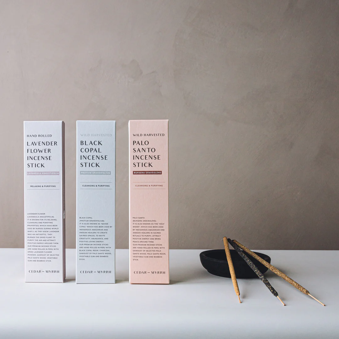 Cedar and Myrrh Hand Rolled Incense Stick range - boxes pictured with a stick of each resting on a black clay smudging bowl - Stocked at LOVINLIFE Co Byron Bay for all your gifts, candles and interior decorating needs