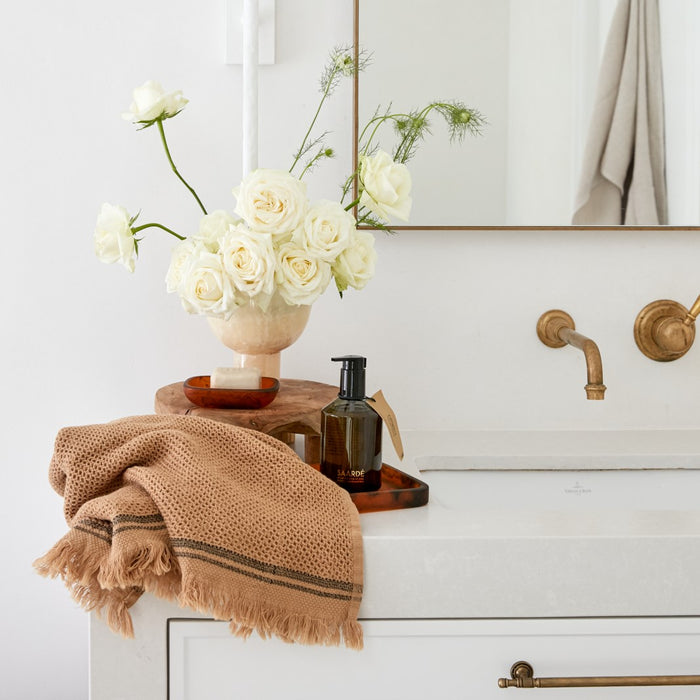 Lovinlife Co ByronBay – Saarde Jasmine Olive Oil Bar Soap – Jasmine Perfume –pictured in red resin soap dish on styled bathroom vanity setting - available at LOVINLIFE Co Byron Bay for all your gifts, candles and interior decorating needs