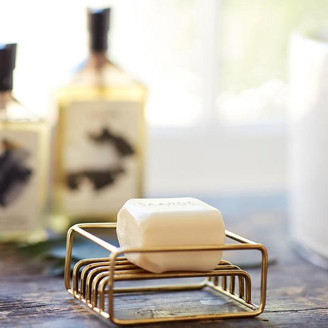 Lovinlife Co ByronBay – Saarde Hamam (Natural) Olive Oil Bar Soap – Lavender, Eucalyptus and Rosemary scent – soap bar resting in metal dish on wooden bench pictured - available at LOVINLIFE Co Byron Bay for all your gifts, candles and interior decorating needs