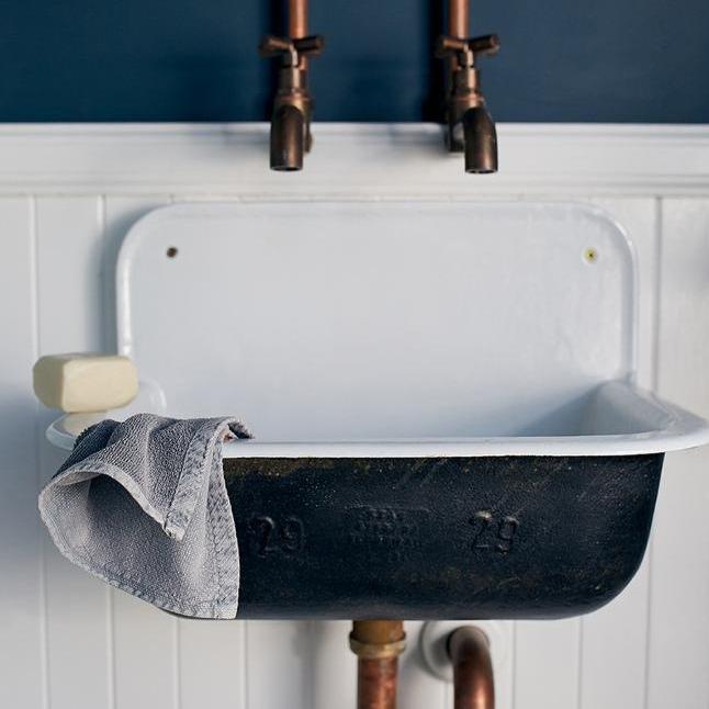 Lovinlife Co ByronBay – Saarde Patchouli Olive Oil Bar Soap – Patchouli scent – soap bar pictured resting on vintage metal sink - available at LOVINLIFE Co Byron Bay for all your gifts, candles and interior decorating needs