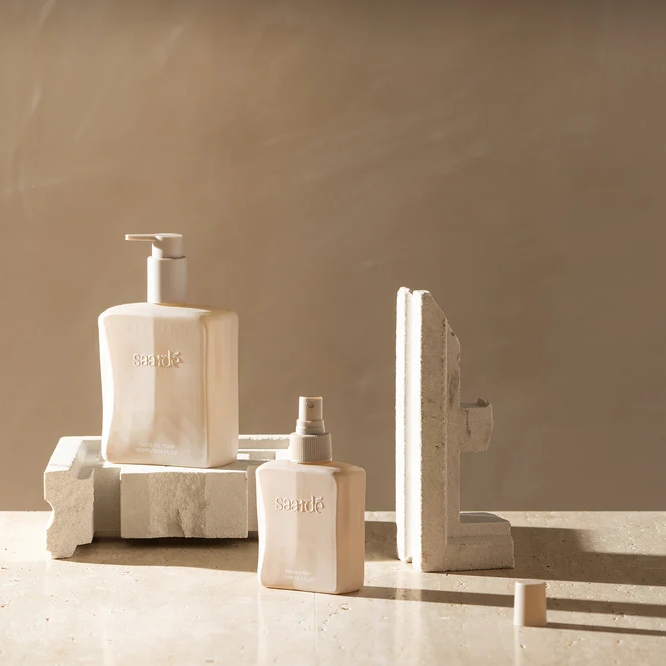 Saarde Room Spray bottle pictured with other saarde product and stones - Stocked at LOVINLIFE Co Byron Bay for all your gifts, candles and interior decorating needs