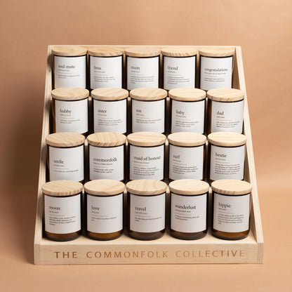 Commonfolk Dictionary Candle Range - amber glass jars with wood lids in retail display shelving - Stocked at LOVINLIFE Co Byron Bay for all your gifts, candles and interior decorating needs