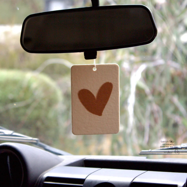 Warm Heart design Air Freshener tags - Made from 100% post-consumer materials - BYRON BAY SCENT: Almond Milk + Coconut Milk, It's all good. go with flow my friend. always follow the energy, it knows the way. Pictured hanging from rear vision mirror. Stocked at LOVINLIFE Co Byron Bay for all your gifts, candles and interior decorating needs