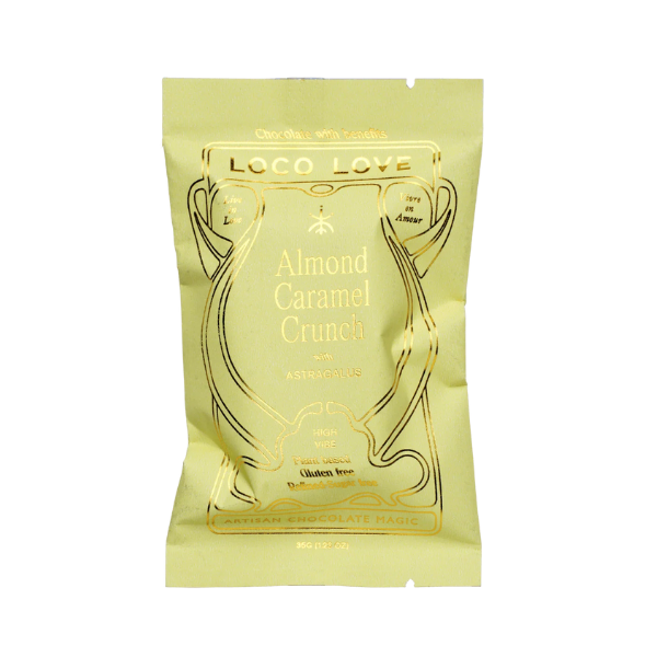 Wrapped (yellow) Loco Love Almond Caramel Crunch Chocolate. Vegan, gluten-free, sustainably sourced and no refined sugars. Available LOVINLIFE Co Byron Bay.