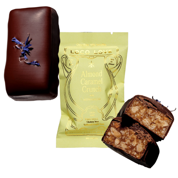 Unwrapped and wrapped (yellow) Loco Love Almond Caramel Crunch Chocolates. Vegan, gluten-free, sustainably sourced and no refined sugars. Available LOVINLIFE Co Byron Bay.