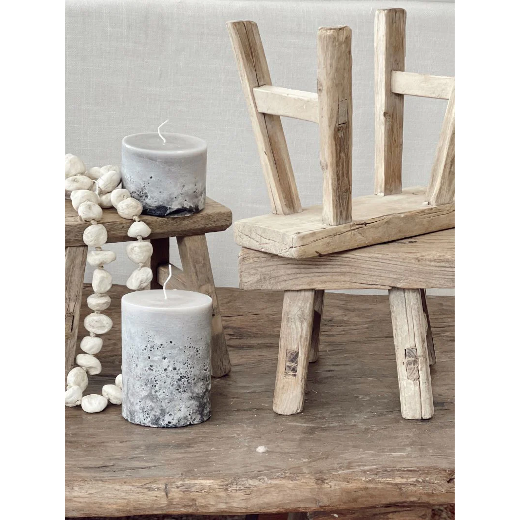 Barefoot Gypsy - Kasana Elm Baby Wood Workers Stool - Multipurpose decor or stepping stool - pictured with candles and stone necklace - Stocked at LOVINLIFE Co Byron Bay for all your gifts, candles and interior decorating needs