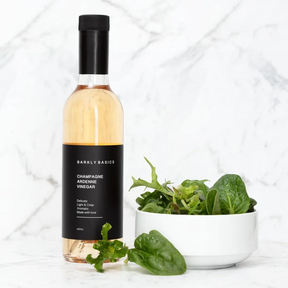 Barkly Basics Gourmet French Ardenne Vinegar - LIMITED EDITION - bottle of vinegar pictured next to bowl of salad leaves - available at LOVINLIFE Co Byron Bay for all your gifts, candles and interior decorating needs