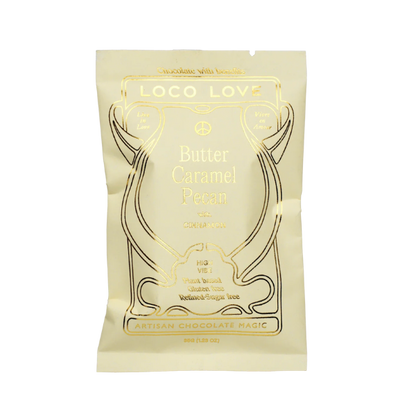 Light Yellow packaging of Loco Love Butter Caramel Pecan Chocolates. Vegan, gluten-free, sustainably sourced and no refined sugars. 
Available LOVINLIFE Co Byron Bay.
