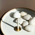 Candle Kiosk Ritual Candle Set - 5 x 40 Min Mindfulness candles - meditation candle pictured on brass stand with rocks - Stocked at LOVINLIFE Co Byron Bay for all your gifts, candles and interior decorating needs