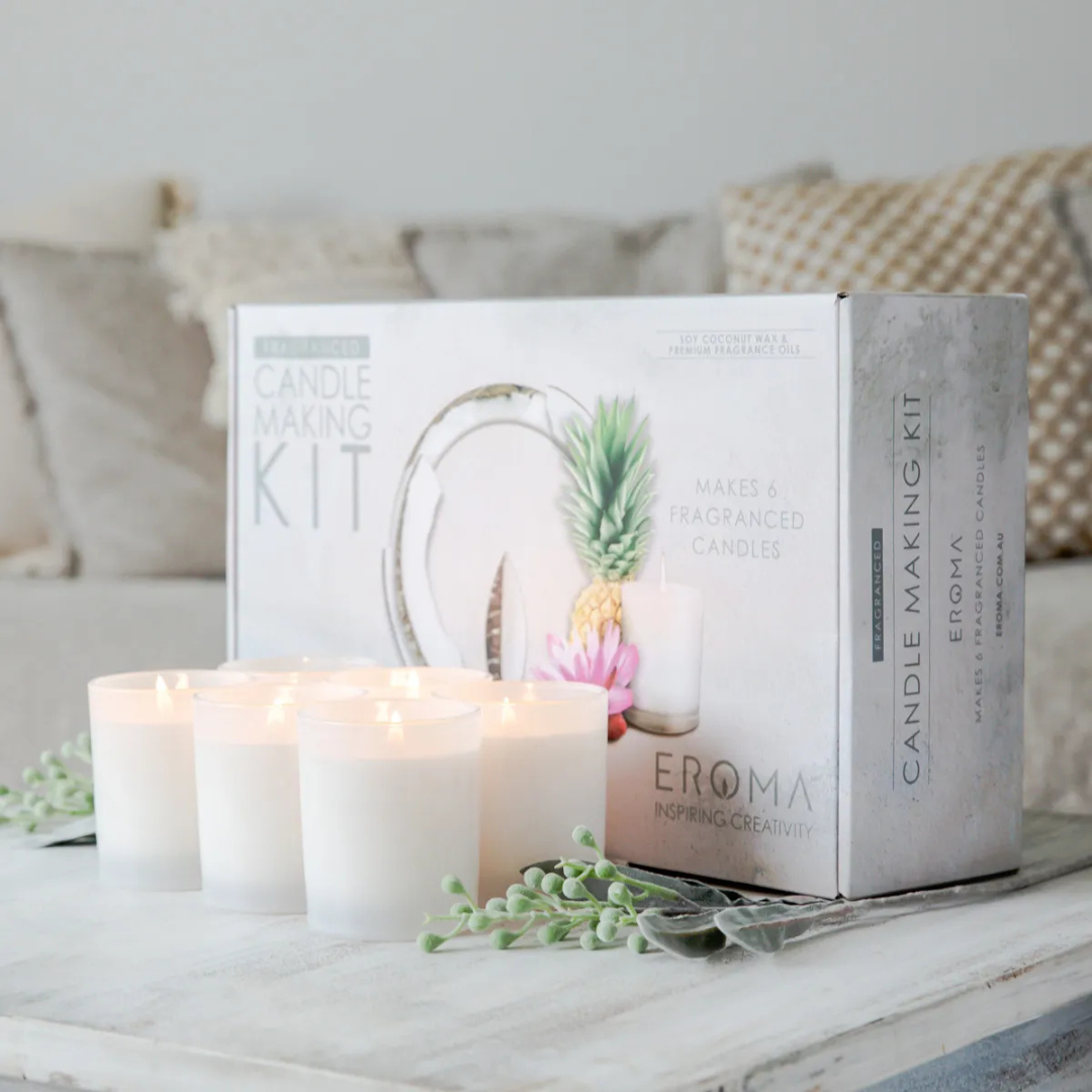 Candle Making Kit - Plain White by Eroma - picture of 6 alight candles in front of the kit box - Stocked at LOVINLIFE Co Byron Bay for all your gifts, candles and interior decorating needs