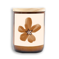 Candle with wooden lid and flower design on label. Earth Essentials, the little candles of goodness you cannot live without. Bringing simple, cute, fun images to our midi's in a fun way! Available at LOVINLIFE Co Byron Bay