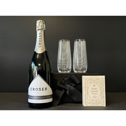 Celebrate Gift Box containing Croser Sparkling Wine, 2 stemless Champagne flutes etched with lines and a twin box of Loco Love Chocolates. Available at LOVINLIFE Co Byron Bay
