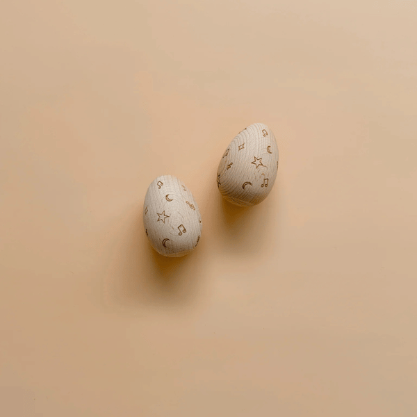 2 x wooden egg shakers by Love Note Co made with FSC certified Beechwood. All  instruments by Love Note Co are handmade items, non-toxic, eco-friendly and sustainably sourced. Stocked at LOVINLIFE Co Byron Bay for all your gifts, candles and interior decorating needs