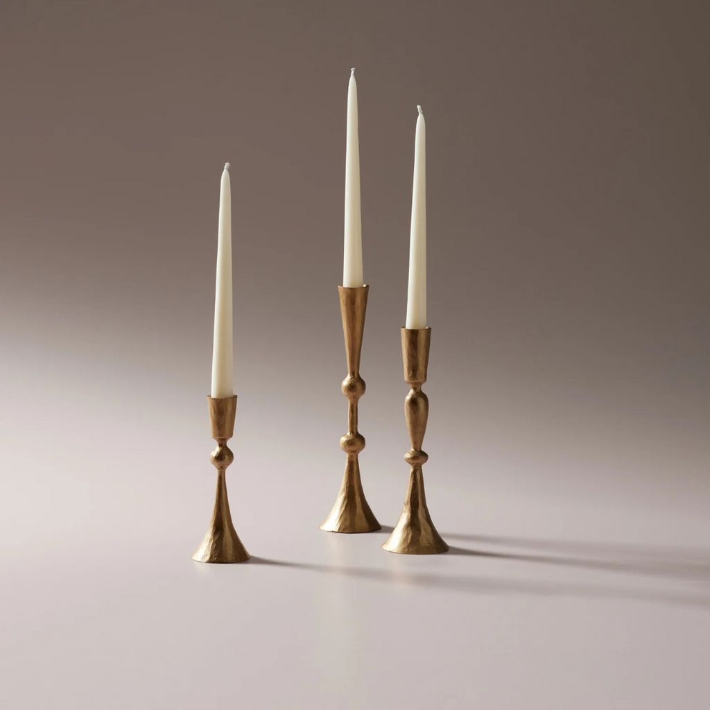 Enchant Brass Candle Stands x 3 all holding white candles - available at LOVINLIFE Co Byron Bay for all your gifts, candles and interior decorating needs