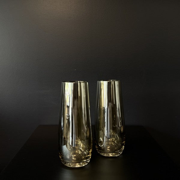 Pair of Francalia Piana Stemless Champagne Glasses gilded in Lustre Bronze, on a black background - Stocked at LOVINLIFE Co Byron Bay for all your gifts, candles, homewares and interior decorating needs