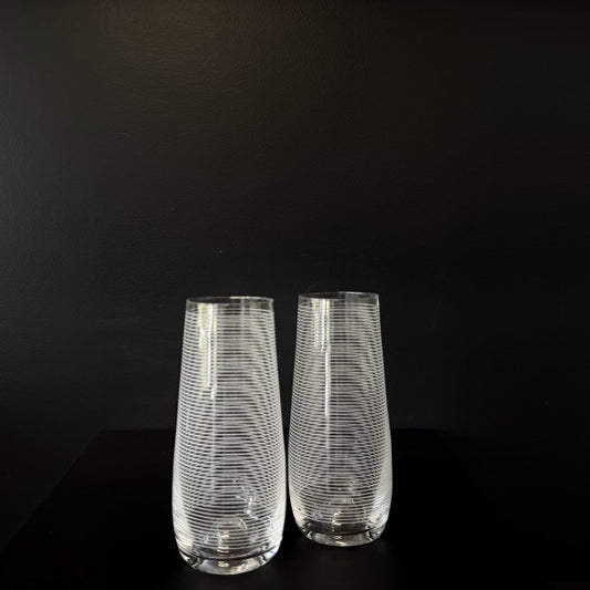 Pair of Francalia Piana Stemless Champagne Glasses etched with Horizontal Stripes, on a black background - Stocked at LOVINLIFE Co Byron Bay for all your gifts, candles, homewares and interior decorating needs