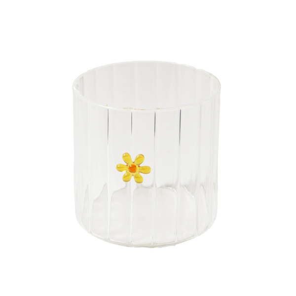 Clear glass tumbler with a yellow flower, pictured on a white background. Part of the Robert Gordon Collection stocked at LOVINLIFE Co Byron Bay for all your gifts, candles, homewares and interior decorating needs